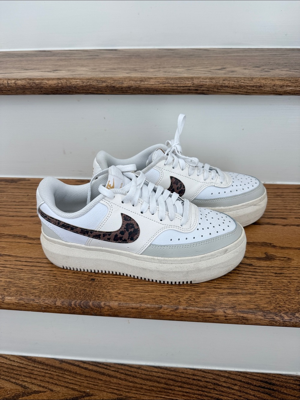 Nike Women’s White Sneakers with Leopard Swoosh